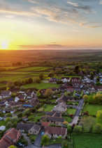English Village and Countryside from above at sunset