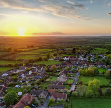 English Village and Countryside from above at sunset