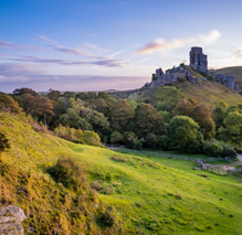 Corfe Castle ruins in English Countryside