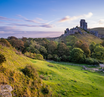Corfe Castle ruins in English Countryside
